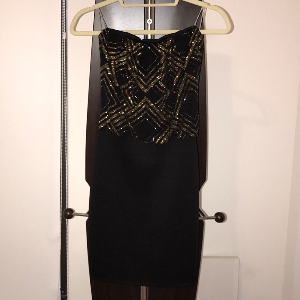 Black and gold sparkly mini dress